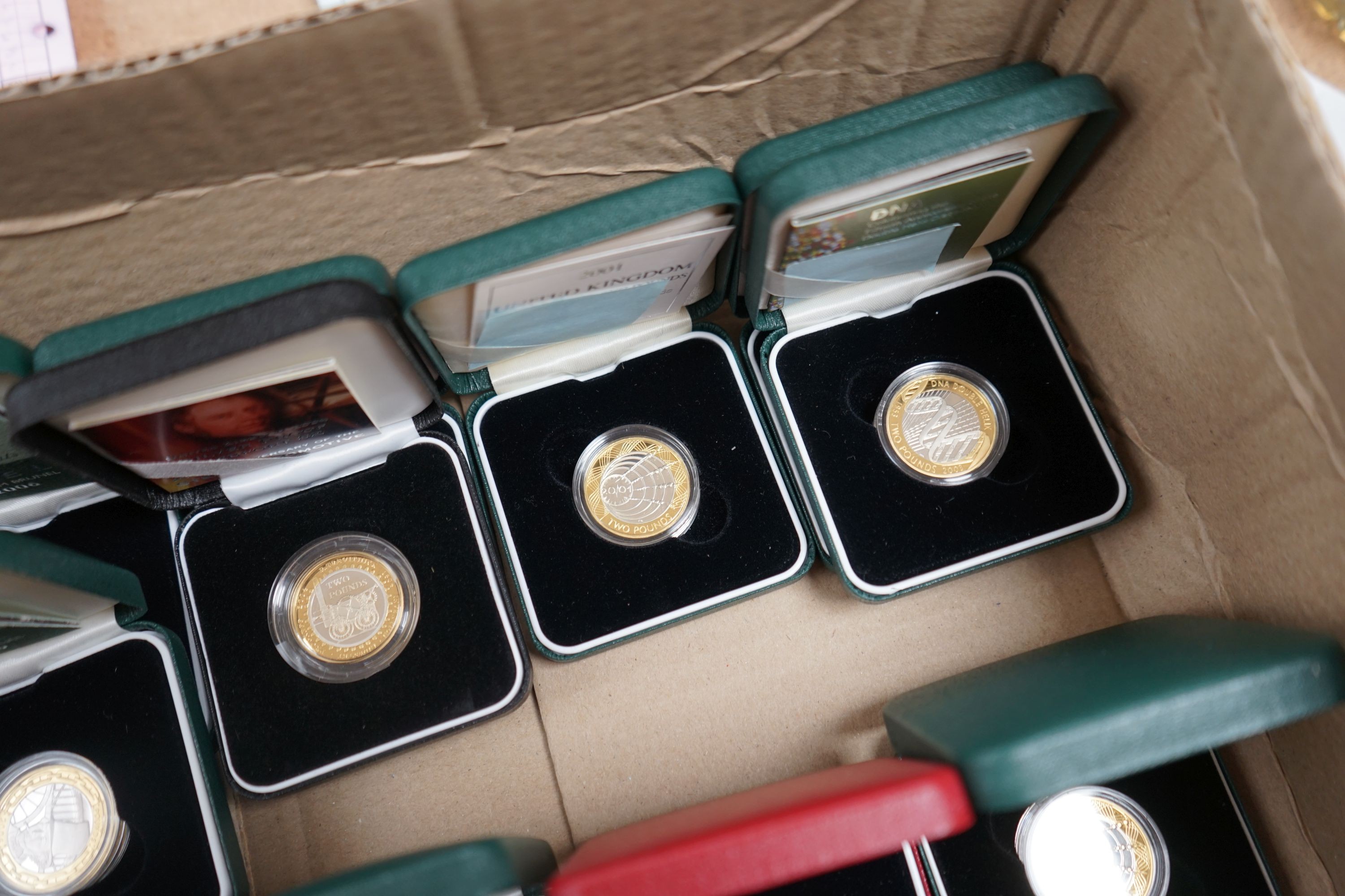 Seventeen cased Royal Mint proof silver £2 coins for 1994, 1996, 1997, 2000, 2 x 2001, 2 x 2003, 2 x 2004, 2005, 2 x 2006, 2007-2009 and 2011-2012